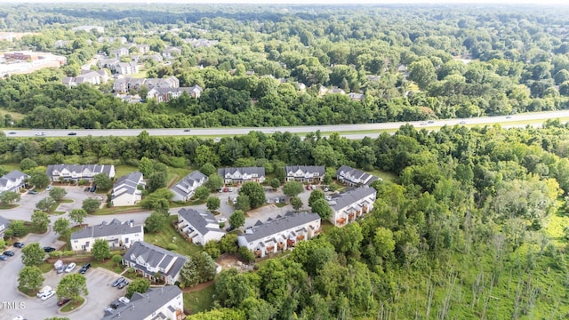4619 Cross Ridge Ln, Greensboro, NC 27410 - aerial view of property and surrounding area with a forest and nearby suburban area