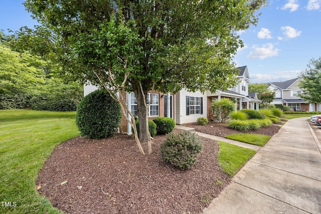 4619 Cross Ridge Ln, Greensboro, NC 27410 - view of property hidden behind natural elements featuring a front lawn