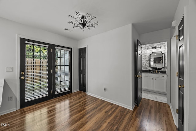 4619 Cross Ridge Ln, Greensboro, NC 27410 - unfurnished bedroom with dark wood-style floors and access to outside