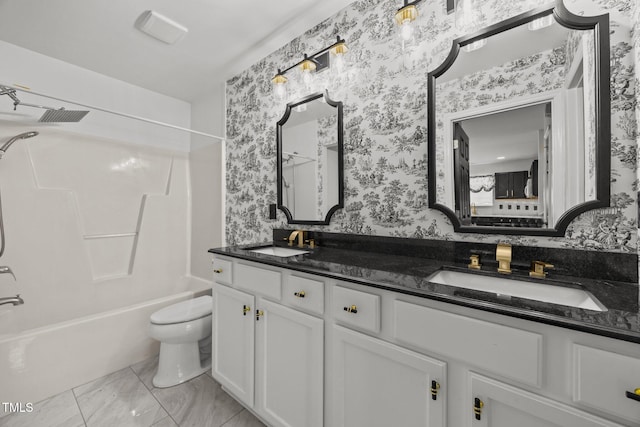 4619 Cross Ridge Ln, Greensboro, NC 27410 - full bath featuring wallpapered walls, double vanity,  shower combination, and marble look tiles