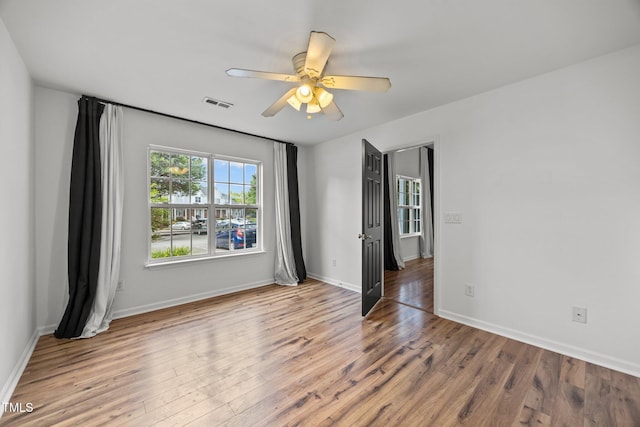 4619 Cross Ridge Ln, Greensboro, NC 27410 - unfurnished room with wood finished floors and a ceiling fan
