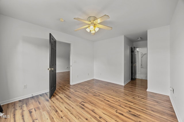 4619 Cross Ridge Ln, Greensboro, NC 27410 - spare room with ceiling fan, light wood finished floors, and a smoke detector
