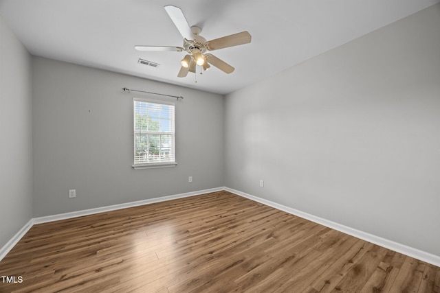 4619 Cross Ridge Ln, Greensboro, NC 27410 - unfurnished room featuring wood finished floors and ceiling fan