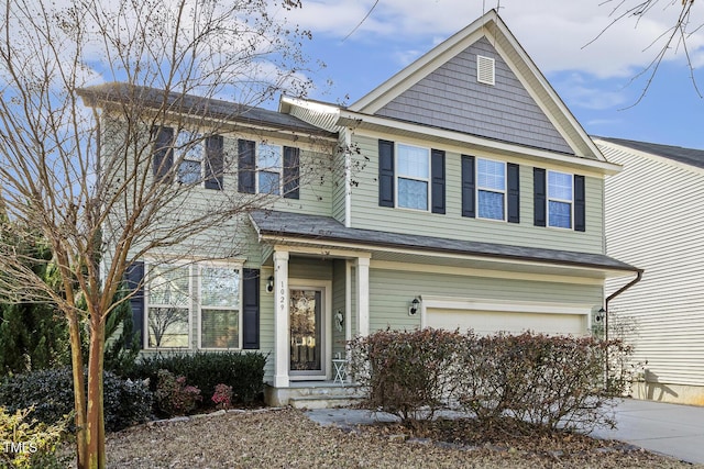 view of front of property featuring a garage