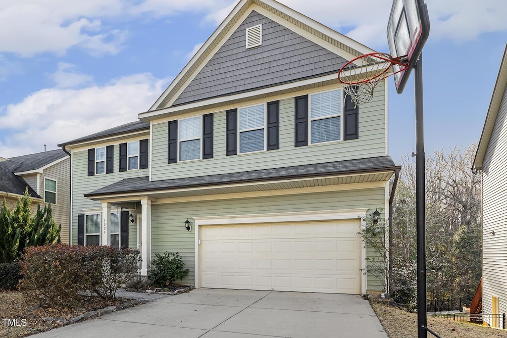 view of front of property featuring a garage