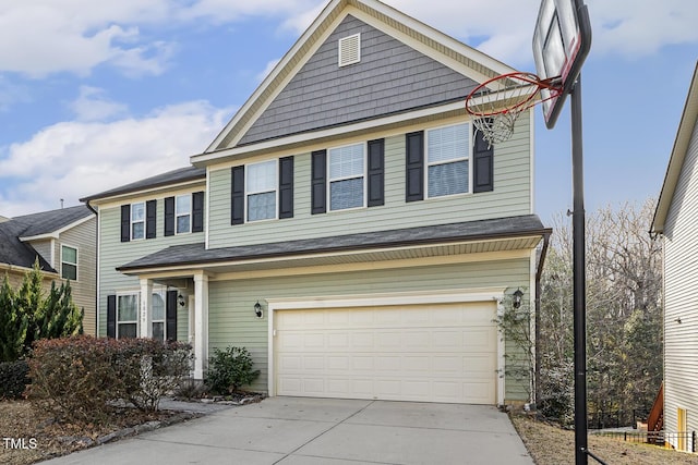 view of front of property featuring a garage