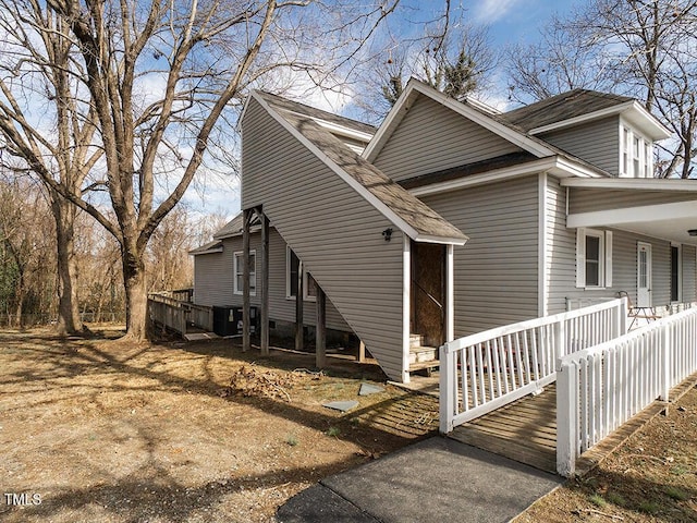 view of front of home with cooling unit