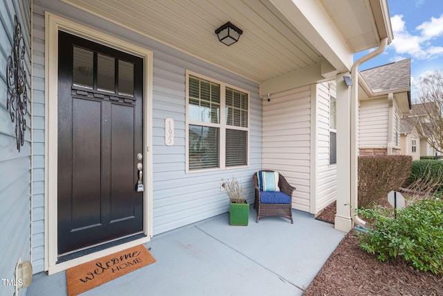 entrance to property with covered porch