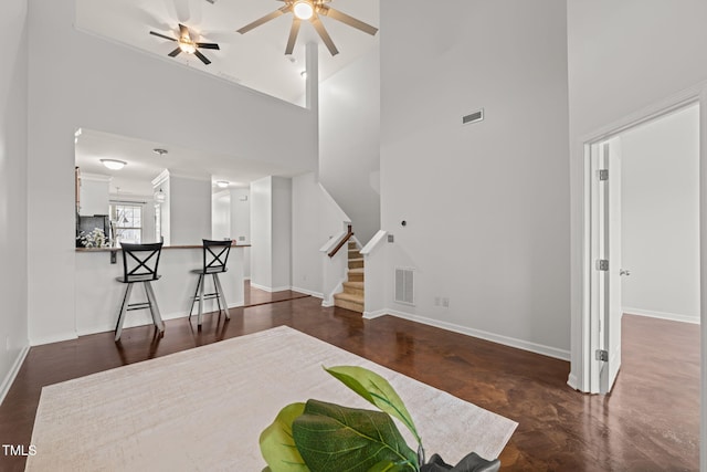 interior space with a towering ceiling