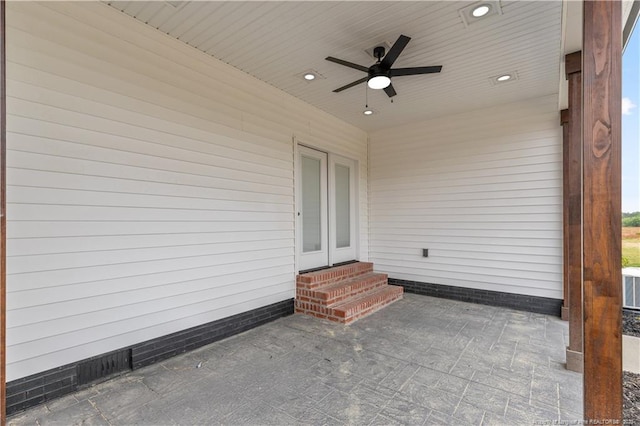 view of patio / terrace with entry steps and a ceiling fan