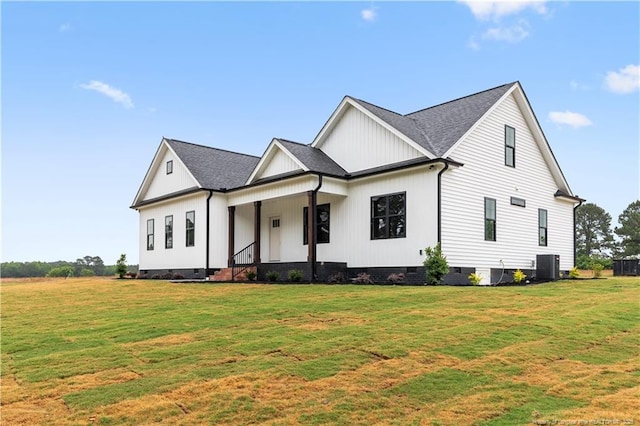 modern inspired farmhouse featuring crawl space, central air condition unit, a front lawn, and board and batten siding