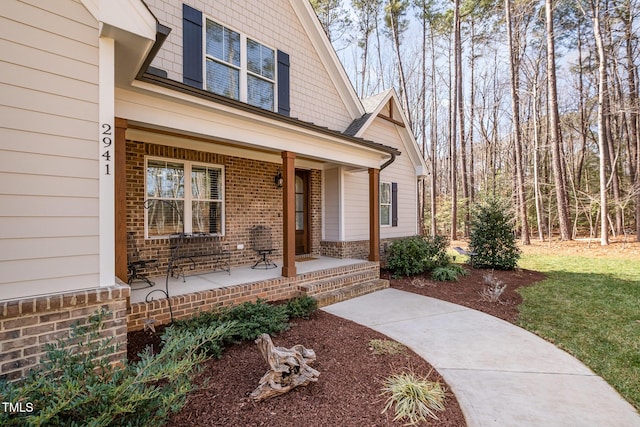 entrance to property with covered porch