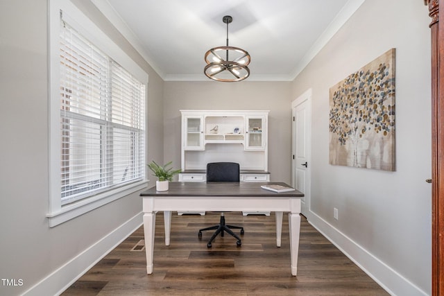 home office featuring dark hardwood / wood-style flooring, crown molding, and a chandelier