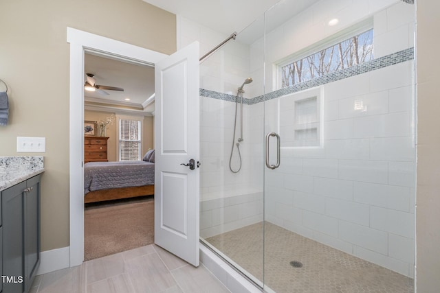 bathroom featuring crown molding, an enclosed shower, a raised ceiling, and a wealth of natural light