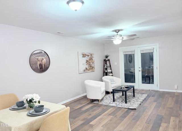 interior space with dark wood-type flooring, ceiling fan, and french doors