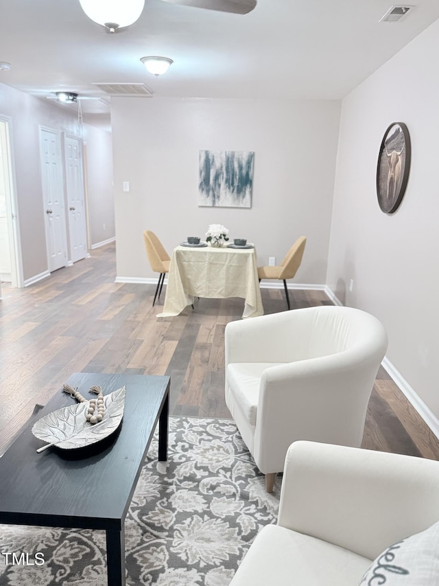 living room with hardwood / wood-style floors