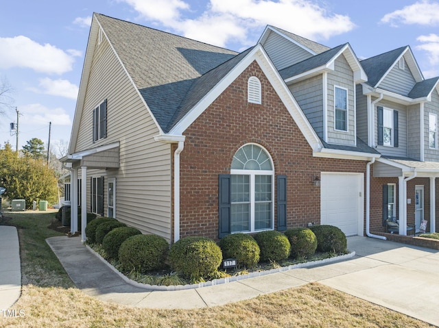 view of side of property featuring a garage