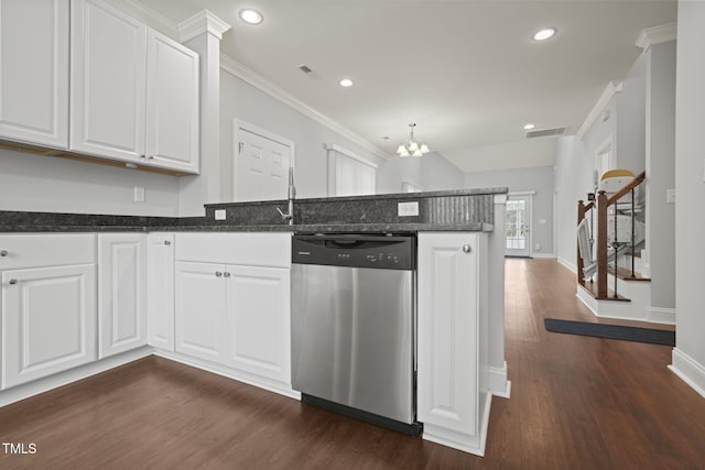 kitchen with white cabinetry, stainless steel dishwasher, dark hardwood / wood-style flooring, and kitchen peninsula