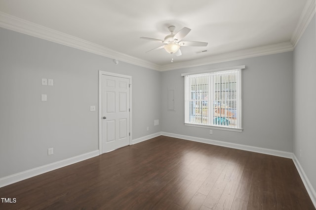 empty room with ornamental molding, dark wood-type flooring, and ceiling fan