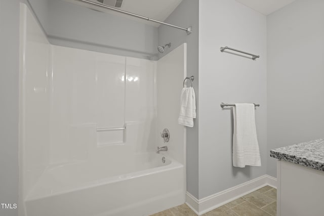 bathroom with vanity and shower / bathing tub combination