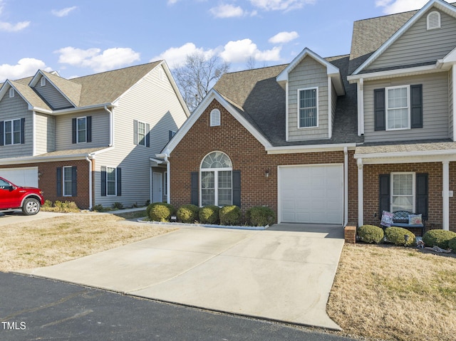 view of front of home with a garage and a front yard