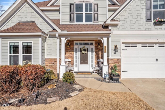 view of exterior entry featuring a garage