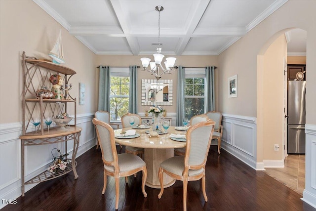 dining space with beamed ceiling, coffered ceiling, dark hardwood / wood-style flooring, and a notable chandelier