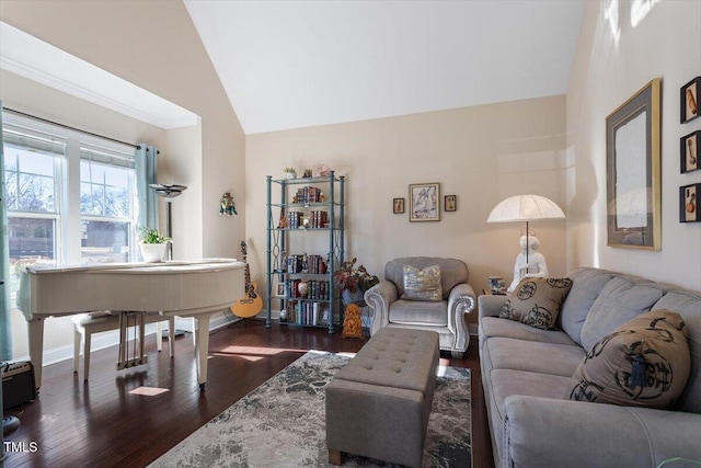 living room featuring dark hardwood / wood-style flooring and vaulted ceiling