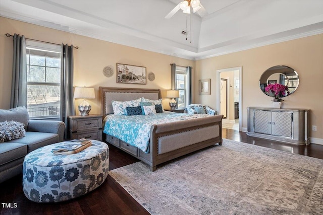 bedroom featuring ornamental molding, dark hardwood / wood-style floors, and ceiling fan