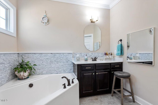 bathroom with vanity, a bath, and crown molding