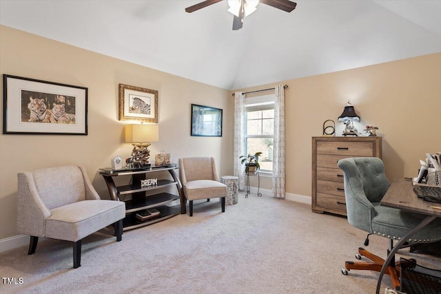 carpeted office featuring vaulted ceiling and ceiling fan