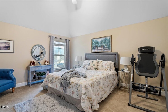 bedroom with light carpet and lofted ceiling