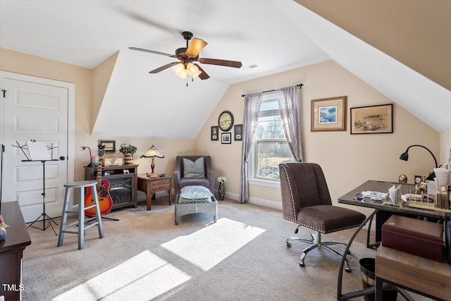 carpeted home office with vaulted ceiling and ceiling fan