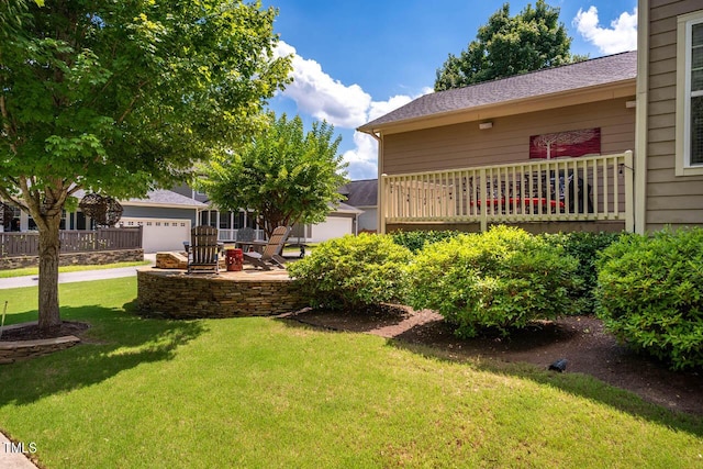 view of yard with a garage