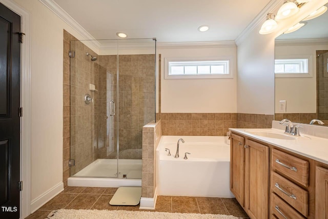 bathroom featuring independent shower and bath, crown molding, tile patterned flooring, and vanity