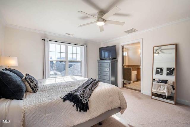 bedroom with ceiling fan, ornamental molding, connected bathroom, and carpet floors