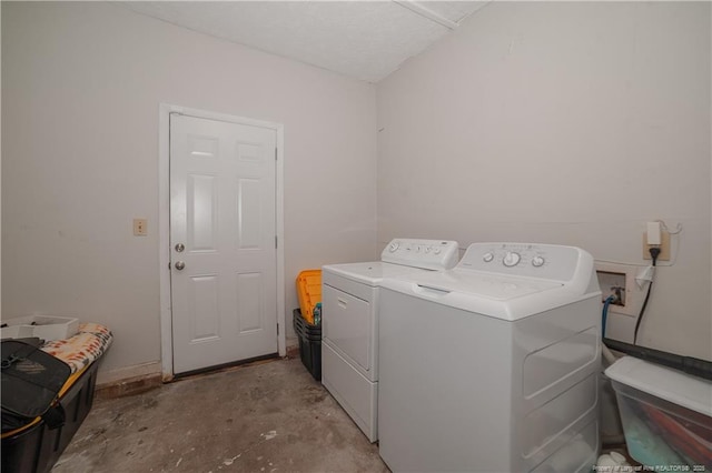 laundry area with washer and clothes dryer