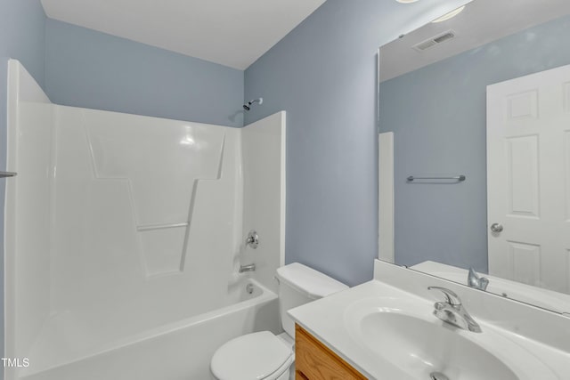 full bathroom featuring vanity, shower / bathtub combination, and toilet