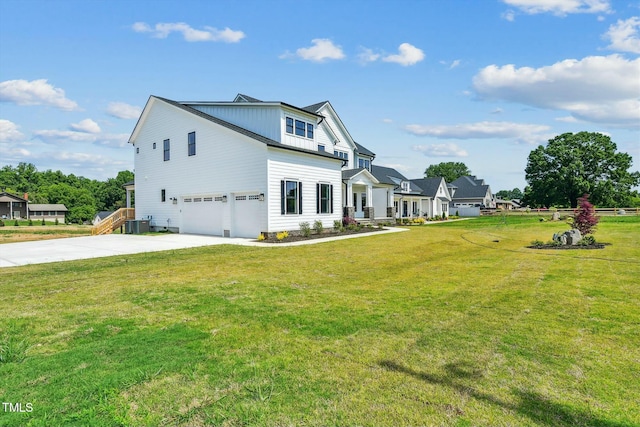 view of front facade featuring a garage and a front lawn