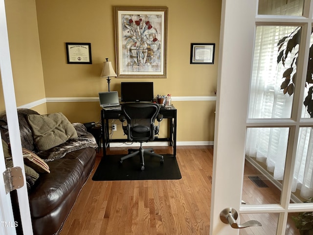 office space featuring light hardwood / wood-style flooring