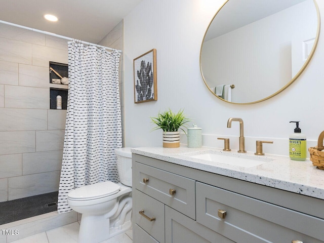 bathroom featuring vanity, tile patterned floors, toilet, and a shower with shower curtain