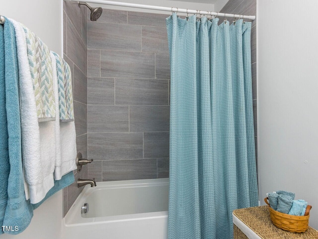 bathroom featuring shower / bathtub combination with curtain