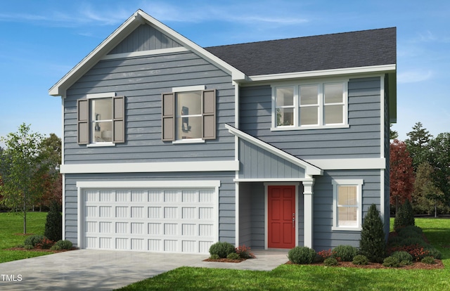 view of front of property with a garage and a front lawn