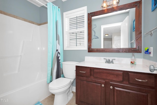 full bathroom with tile patterned floors, vanity, toilet, and shower / bath combo