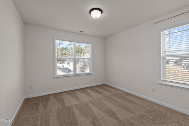 view of carpeted spare room