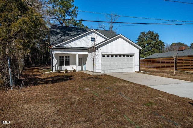 modern farmhouse style home with a garage and a front lawn