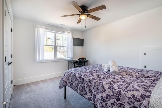 carpeted bedroom featuring ceiling fan