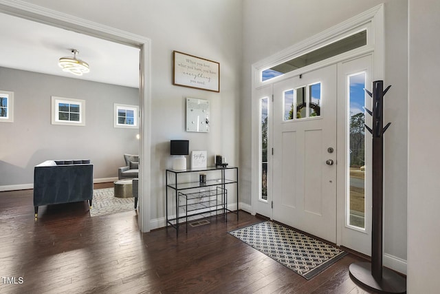 entryway with dark wood-type flooring