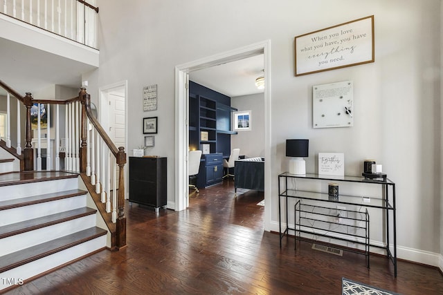 foyer featuring dark hardwood / wood-style floors