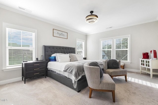 carpeted bedroom featuring ornamental molding